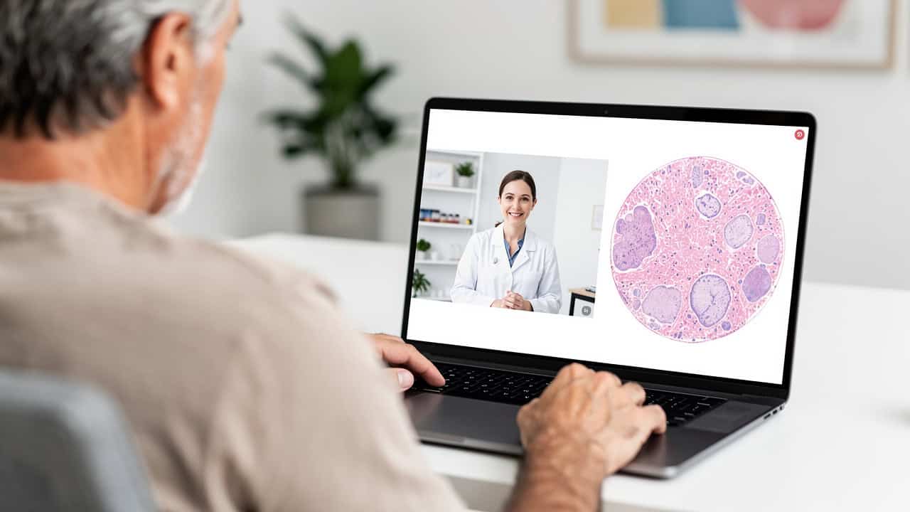A patient discusses a Biopsy slide second opinion through a telemedicine visit.