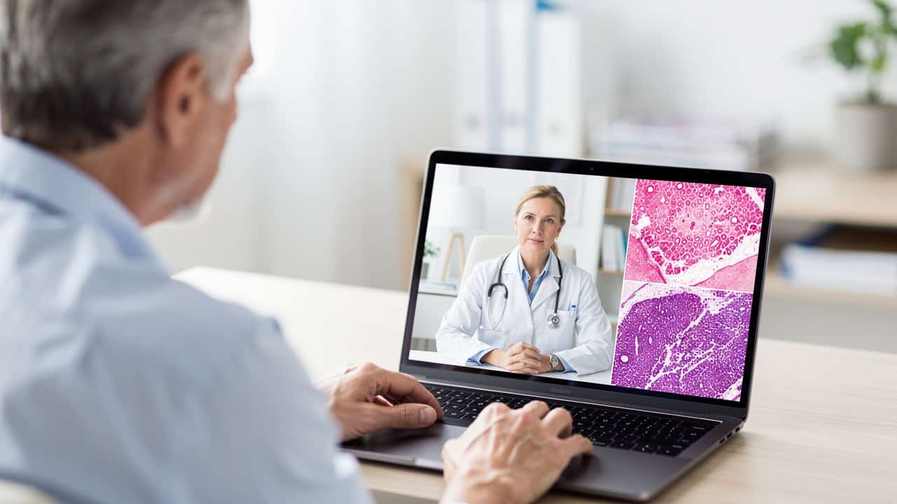 Patient using telemedicine to discuss a Pathology slides second opinion with a doctor.