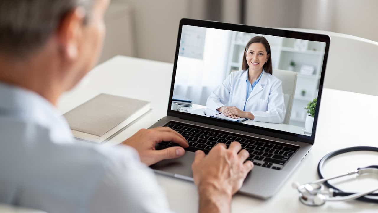A patient joins a telemedicine visit to discuss a Second opinion request.