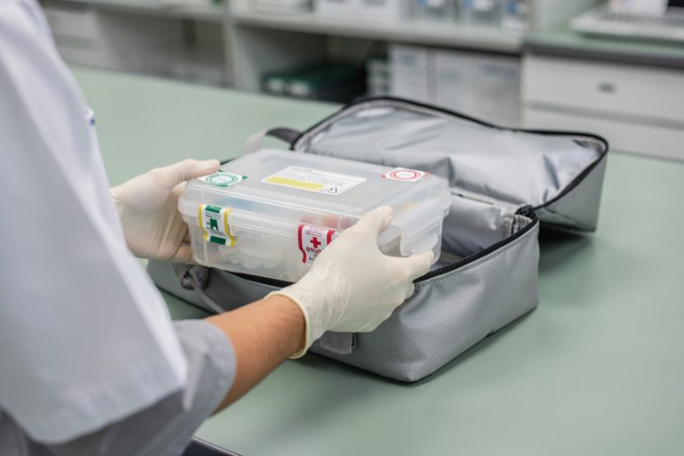 Sealed pathology transport box representing how pathology samples are shared for second opinions.