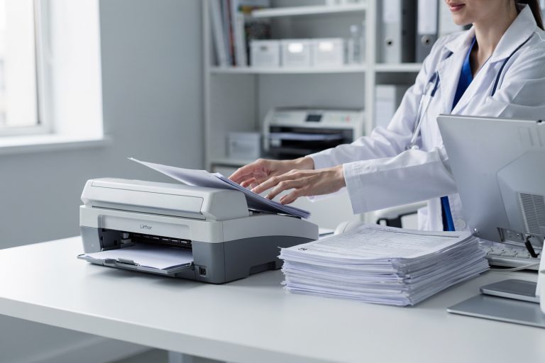 Medical records being scanned for an online pathology consultation costs guide
