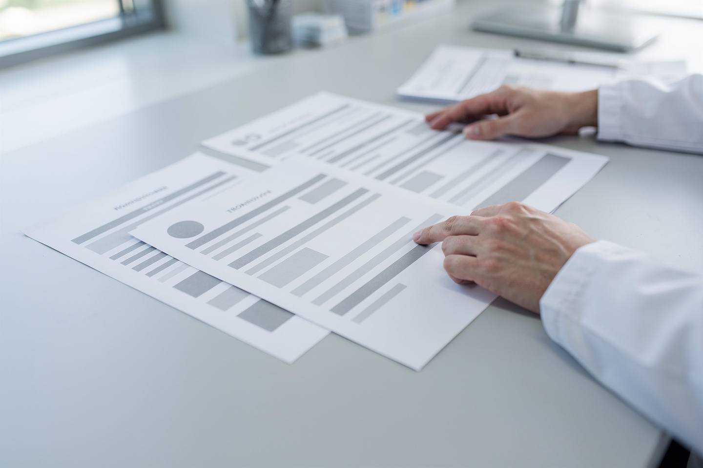 Close-up of pathology report pages and medical records, illustrating how to decode pathology report results.