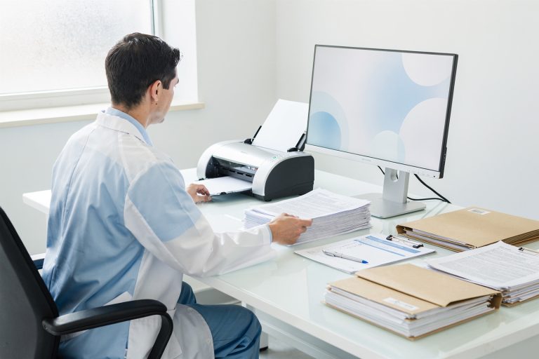 Medical records being scanned for a second opinion diagnosis treatment review.