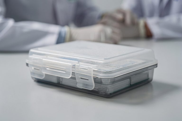 A sealed pathology slide transport box representing consultation versus full second opinion review for cancer diagnosis decisions.